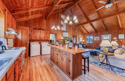 Brigands' Bay House | Cozy Canalfront Cottage w/Hot Tub, Private Boat Dock, Smart TVs, Screened Porch