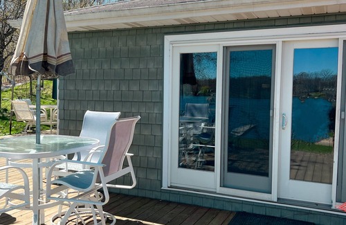 Gobles Cottage | Cozy Cottage Lakefront View - Paddle Board, Kayak, Hot Tub and more!
