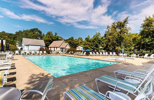 Summer Village Cottage | Cozy Cottage with Pools, Pickleball, Game Room, and Trolley to Nearby Beaches