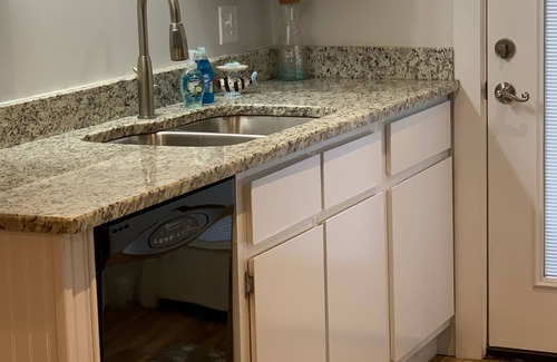 Navarre House | Cozy cottage with private shaded patio and grilling area. Perfect Retreat!
