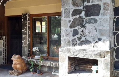 Panajachel Cottage | Cozy country cottage with wooden ceilings and stone walls within nature reserve.