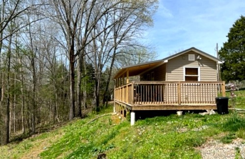 Lucas House | Cozy Cove. A cozy one bedroom tiny home.