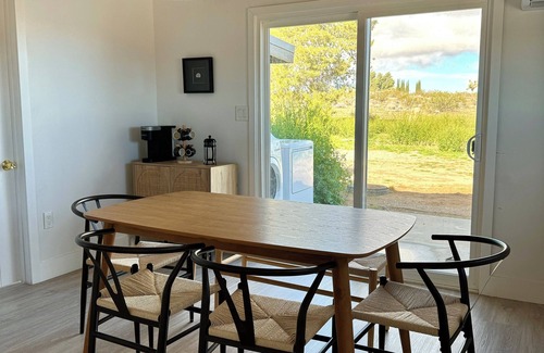 Landers House | Cozy Desert Getaway with 5 acres of land and wood fired hot tub. Pet friendly!