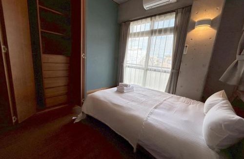 Chatan Apartment | Cozy & Ensoleille Minato