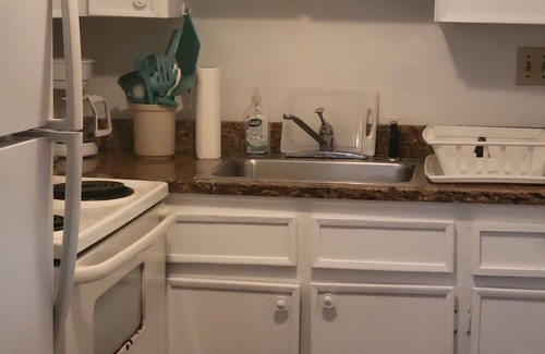 Discovery Bay Condo | Cozy Garden Unit in Lucaya area is a 2 minute walk to the spectacular beach.