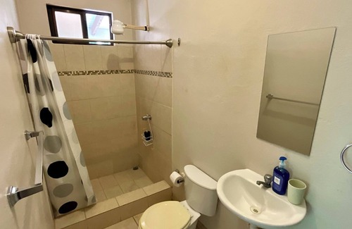 Coco Hotel | Cozy hotel with private bathrooms and shared kitchen, near the beach