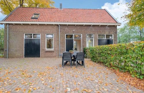 Municipality of Westerveld House | Cozy Holiday Home by the Canal in Dwingeloo