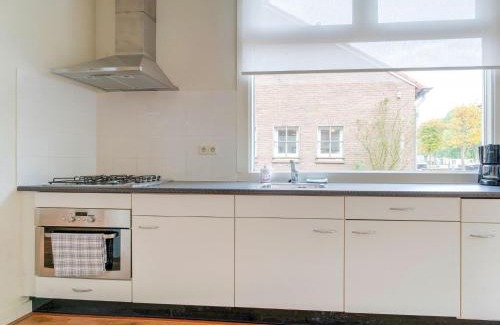 Municipality of Westerveld House | Cozy Holiday Home by the Canal in Dwingeloo