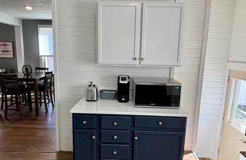 Sioux Falls House | Cozy home near Premier Center, Downtown & Hospital: 65"TV & Fenced Yard-Sleeps 7