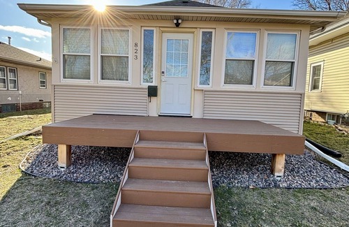 Sioux Falls House | Cozy home near Premier Center, Downtown & Hospital: 65"TV & Fenced Yard-Sleeps 7