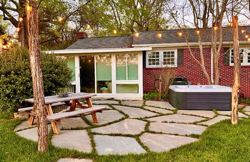 Mills River Cottage | Cozy home w/hot tub & huge fenced yard & firepit!
