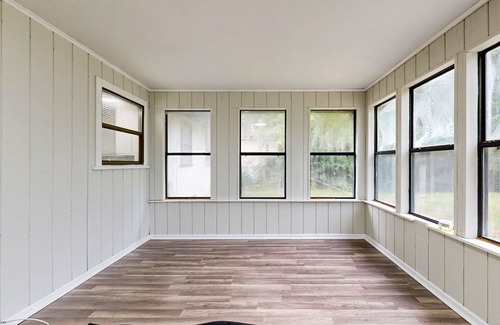 Riverview House | Cozy home with large patio, sun room, private W/D, central AC, and WiFi