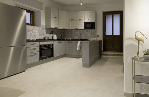 Passignano sul Trasimeno Apartment | Cozy apartment equipped with all comforts to accommodate up to 3 people. The flat is located in a renovated former period oil mill, which offers to its guests many shared services: access to the seasonal pool, small area used as a gym, playground and equ