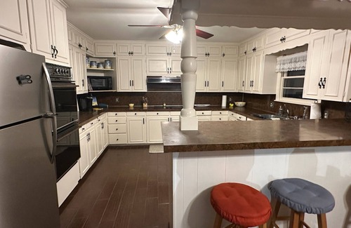 Mead House | Cozy lake retreat in Sand Point! Game room with deck and views of Lake Texoma.