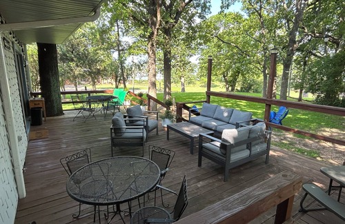 Mead House | Cozy lake retreat in Sand Point! Game room with deck and views of Lake Texoma.