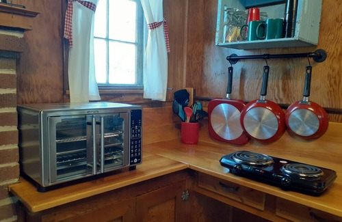 Broomfield Cabin | Cozy lakefront cabin with fireplace, private beach, kayaks. Open year round!