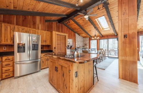 Oakland House | Cozy Lakefront Retreat w/Dock, Hot Tub & Fireplace