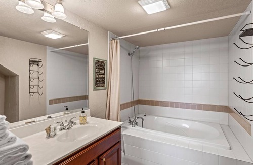 Birchwood Condo | Cozy Lakeside Retreat on Red Cedar Lake Perfect for Family Spring Break Trips