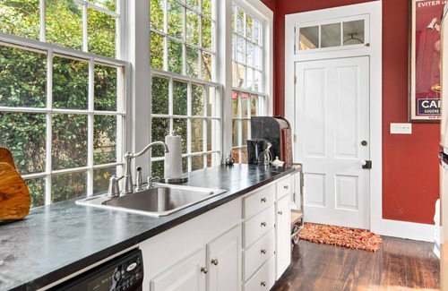 Natchez House | Cozy " Little Brick" house, located downtown. Unique & walkable to everything!