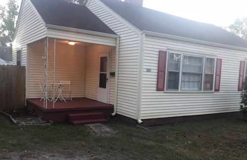 Huntsville House | Cozy little yellow jewel box home away from home