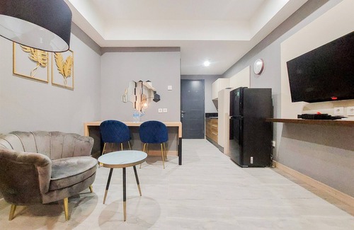 Pinang Apartment | Cozy Living 1Br Collins Boulevard Apartment