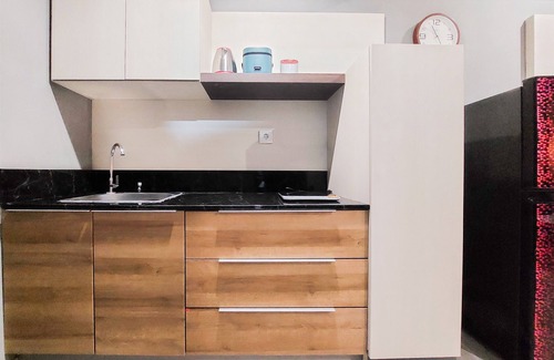 Pinang Apartment | Cozy Living 1Br Collins Boulevard Apartment