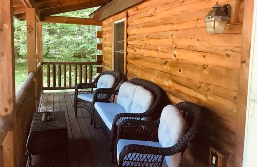 Bellaire Cabin | Cozy Log Cabin in a Quiet Beautiful Wooded Setting