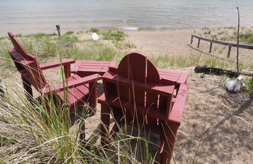 Sturgeon Bay Cabin | Cozy Log Cabin ON THE WATER with the Best Sand Beach in Door County!