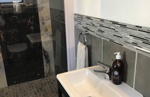Greater Johannesburg Metropolitan Area House | Cozy Luxury.Bedroom with en-suite modern bathroom in a safe, peaceful location.