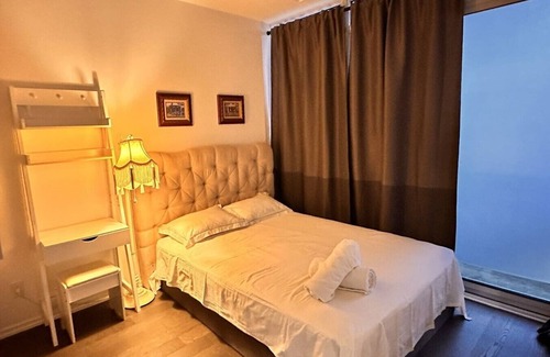 Chaplin Estates Apartment | Cozy Midtown Condo Steps to Subway & Amenities