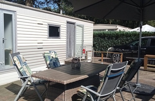 Schoonloo House | Cozy, mobile home Banjer at camping de Tien Heugten in Schoonloo