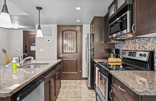Dead Man's Flats Apartment | Cozy Mountain Hideaway, King Bed, hot tub, free parking, Wi-Fi, up to 4 people!