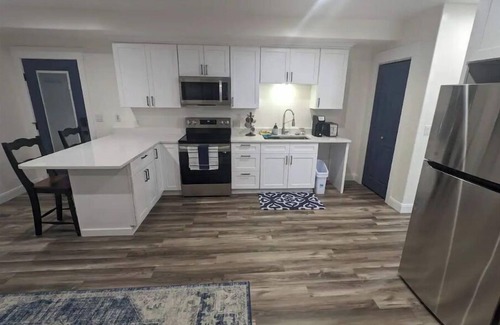 Herriman Apartment | Cozy Mountain-View Haven/Full Kitchen/Hot Tub/Easy SLC & Ski Access