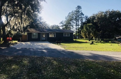 Inverness House | Cozy Oasis nestled on 2 acres w pool and lake views