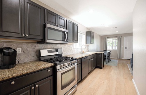 City Heights House | Cozy Pet Friendly Escape with Outdoor Dining