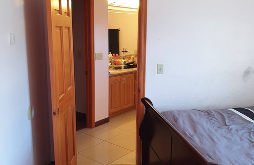 South Redlands House | Cozy Pink Room in quiet Redlands home with AC, WiFi.