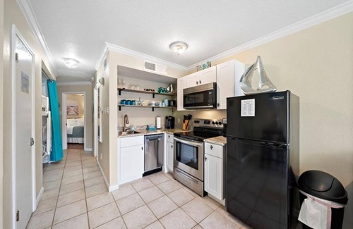 Galveston Condo | Cozy Poolside Condo with over-sized balcony and Gulf Views!