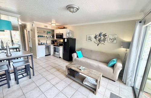 Galveston Condo | Cozy Poolside Condo with over-sized balcony and Gulf Views!
