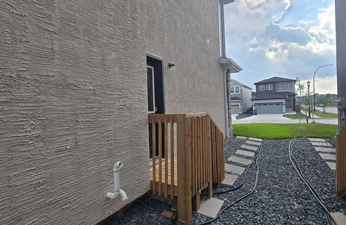 Winnipeg House | Cozy private bsmt suite |Bonavista |Fireplace, workspace & nature-inspired decor