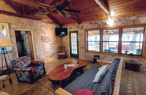 Lago Vista Cabin | Cozy, private waterfront stone cabin on the north shore of Lake Travis