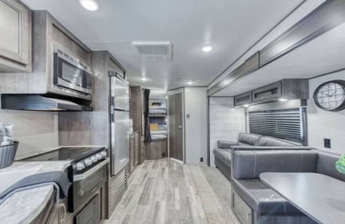 Tower District House | Cozy Retreat on Wheels: Charming RV Trailer