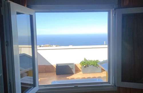 Cueva del Viento Condo | Cozy room for one or two women or couples in our home