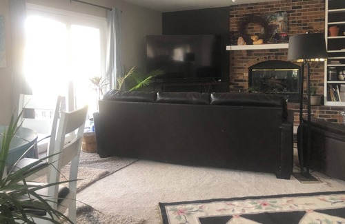 Richfield House | Cozy spacious home with fireplace privacy deck next mall America