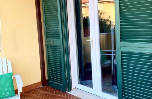 Isola Sacra Apartment | Cozy studio flat with patio, 5 minutes to Fiumicino airport.