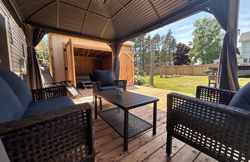 Summerside House | Cozy Summerside Retreat | Hot Tub + Fireplaces