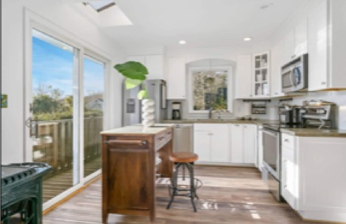 Montauk House | Cozy sun drenched beach cottage private beach, walk to town, hot tub