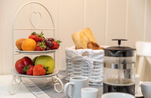 Zingst Apartment | Cozy vacation apartment on the Baltic Sea in the green, with fireplace and sauna.