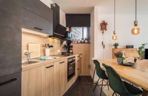 Schoenwald Apartment | Cozy Vacation Apartment 117 with Garden View, Wi-Fi and Balcony
