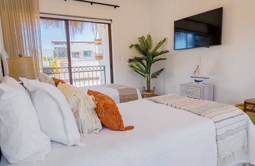 Loreto Villa | Cozy villa with shared pool, rooftop hang out, and centrally located