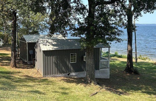 Negreet Cabin | Cozy water front cabin next to boat launch and swimming area!